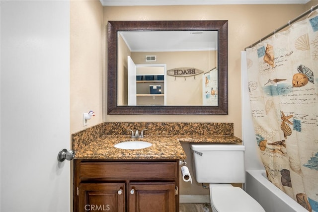 bathroom with vanity, ornamental molding, shower / tub combo with curtain, visible vents, and toilet