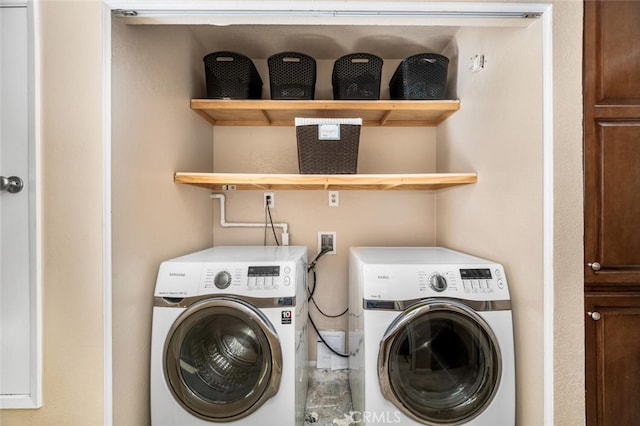 laundry area featuring laundry area and washing machine and dryer
