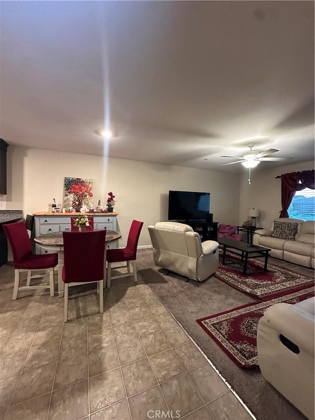 628 Marcus St, Merced, CA 95341 - living area with a ceiling fan and tile patterned flooring
