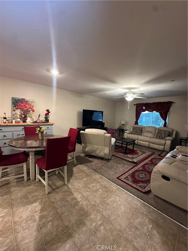 628 Marcus St, Merced, CA 95341 - living area featuring tile patterned floors and a ceiling fan