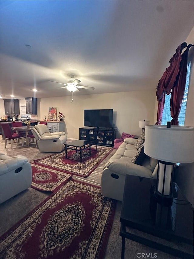 628 Marcus St, Merced, CA 95341 - carpeted living area with ceiling fan