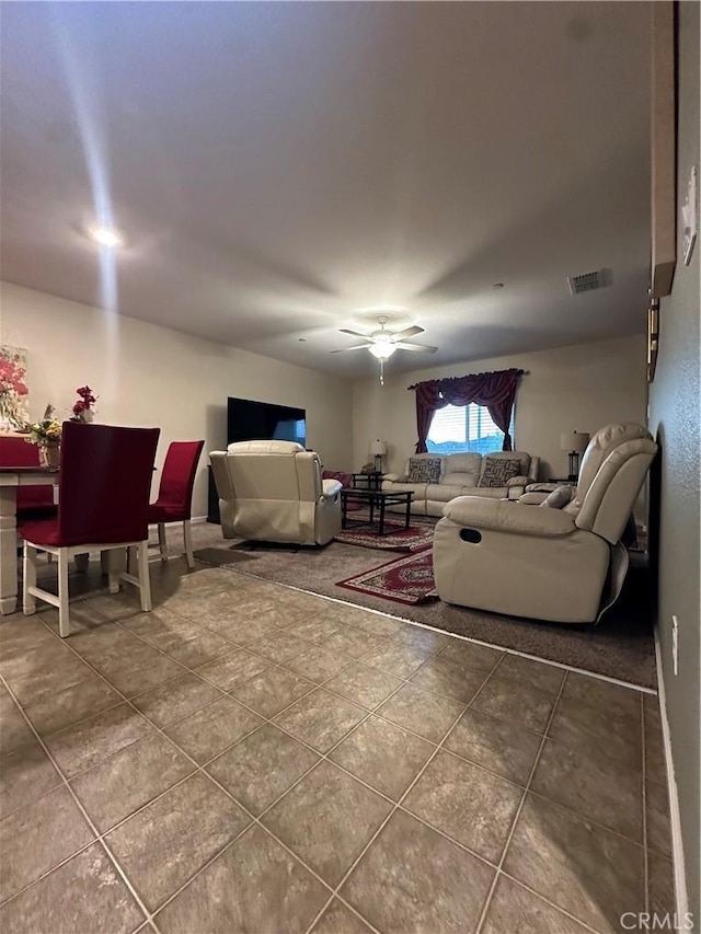 628 Marcus St, Merced, CA 95341 - living area with tile patterned flooring, a ceiling fan, and visible vents