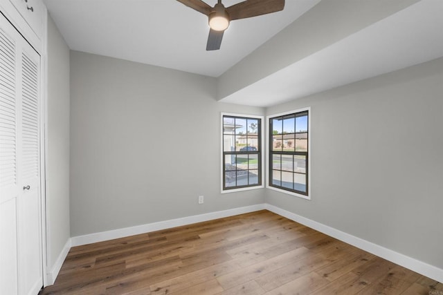 6662 Birchwood St, San Diego, CA 92120 - unfurnished bedroom featuring wood finished floors, a closet, baseboards, and a ceiling fan