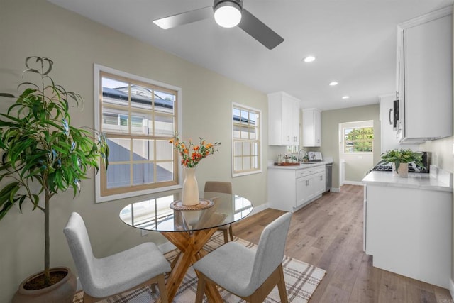 6662 Birchwood St, San Diego, CA 92120 - dining space with a ceiling fan, recessed lighting, light wood-style flooring, and baseboards