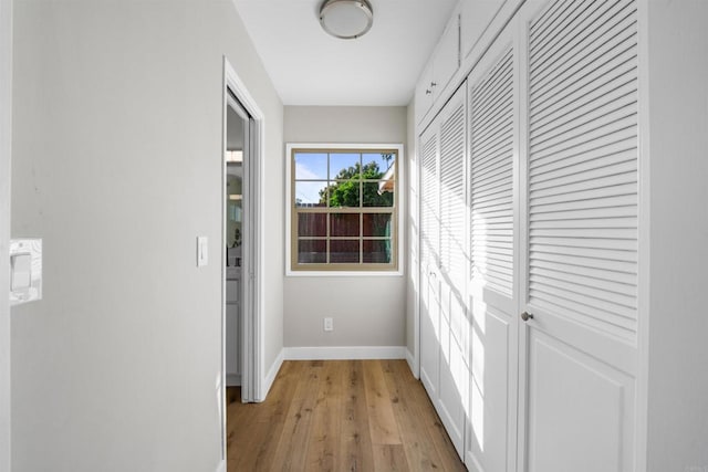 6662 Birchwood St, San Diego, CA 92120 - hallway featuring baseboards and light wood-style flooring