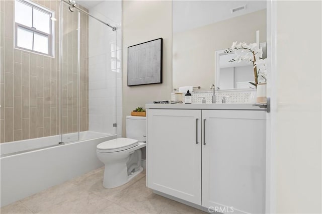 full bath with visible vents, tile patterned flooring, vanity, bathing tub / shower combination, and toilet