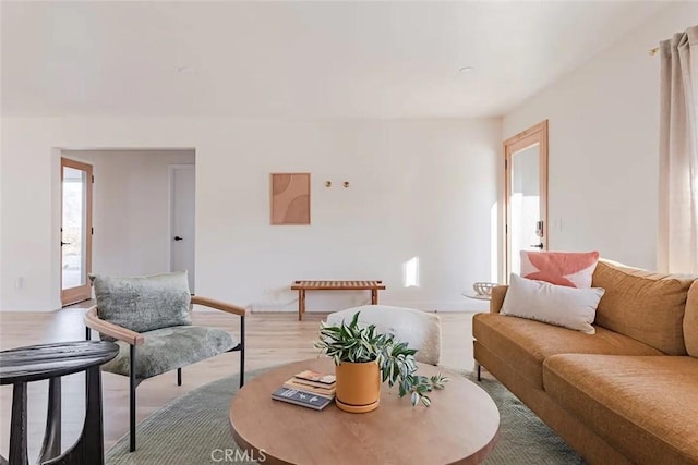 living area featuring light wood-style flooring