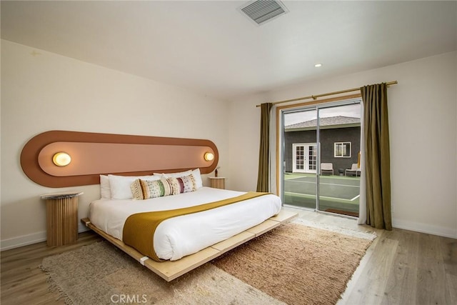 61584 Pueblo Trl, Joshua Tree, CA 92252 - bedroom with access to exterior, wood finished floors, baseboards, and recessed lighting