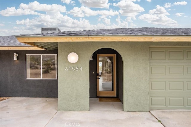 61584 Pueblo Trl, Joshua Tree, CA 92252 - entrance to property with stucco siding and roof with shingles