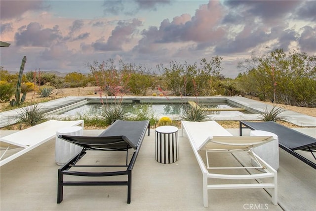 61584 Pueblo Trl, Joshua Tree, CA 92252 - view of patio / terrace with an outdoor pool