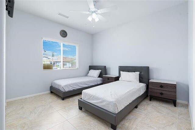 68245 Peladora Rd, Cathedral City, CA 92234 - bedroom featuring visible vents, baseboards, and ceiling fan