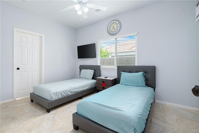 68245 Peladora Rd, Cathedral City, CA 92234 - bedroom with baseboards and ceiling fan