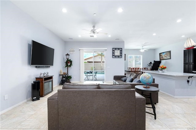 68245 Peladora Rd, Cathedral City, CA 92234 - living area with recessed lighting, ceiling fan, baseboards, and a fireplace