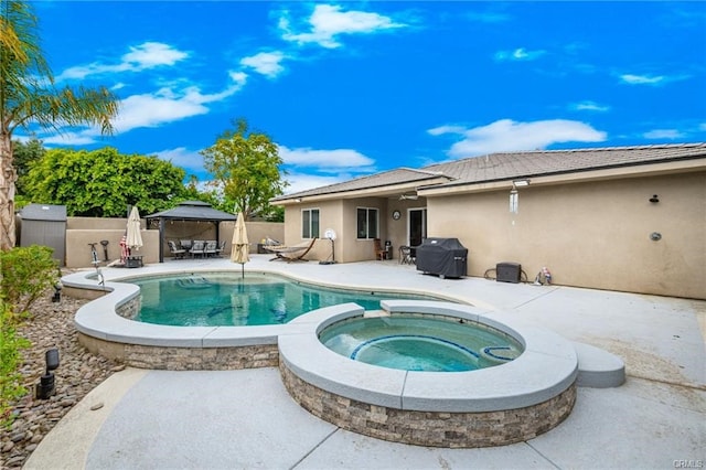 68245 Peladora Rd, Cathedral City, CA 92234 - view of swimming pool featuring a gazebo, fence, area for grilling, and a patio