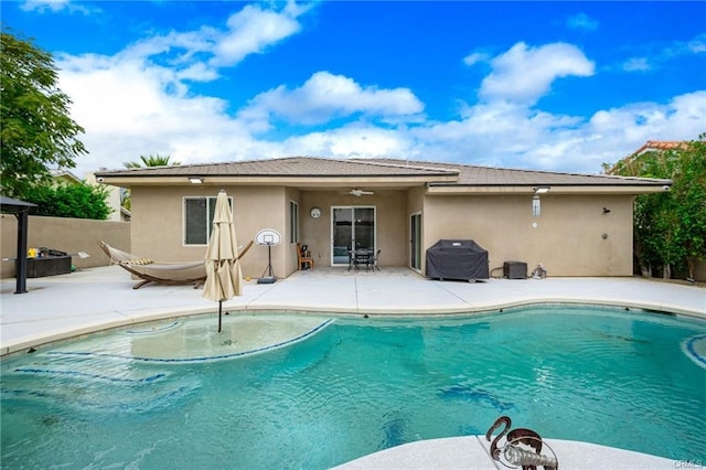 68245 Peladora Rd, Cathedral City, CA 92234 - view of swimming pool with a fenced in pool, ceiling fan, and a patio area