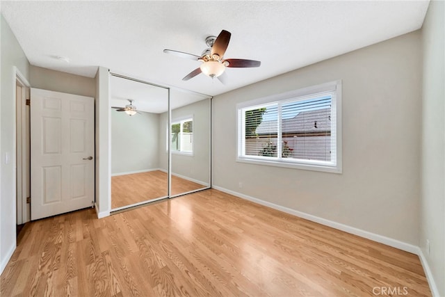 31341 Via Sonora, San Juan Capistrano, CA 92675 - unfurnished bedroom featuring light wood-type flooring, a ceiling fan, baseboards, and a closet