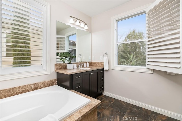 12 Starflower, Lake Forest, CA 92630 - full bath with marble finish flooring, vanity, and a garden tub