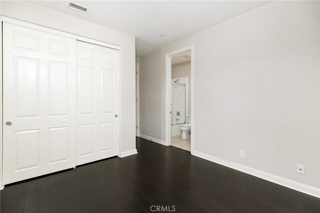 12 Starflower, Lake Forest, CA 92630 - unfurnished bedroom with wood finished floors, a closet, and ensuite bath