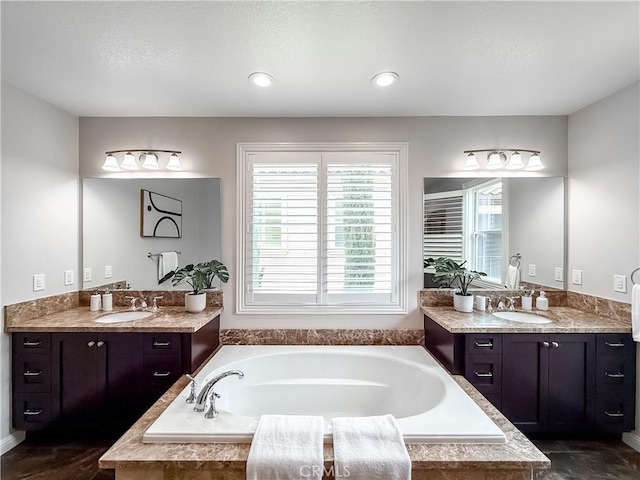 12 Starflower, Lake Forest, CA 92630 - full bathroom with a bath and two vanities