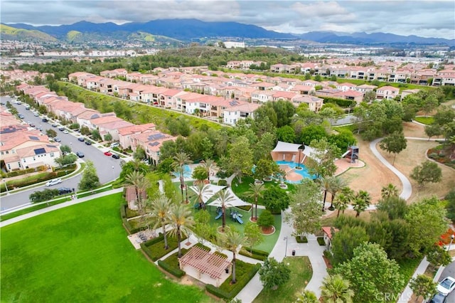 12 Starflower, Lake Forest, CA 92630 - aerial overview of property's location with a mountainous background and nearby suburban area