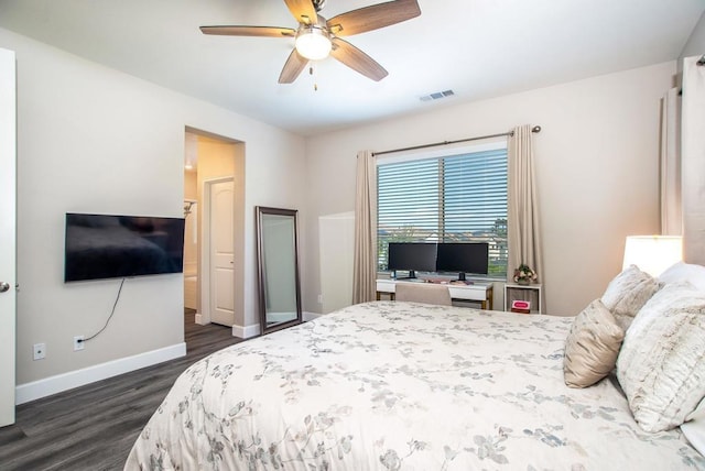 bedroom featuring baseboards, ceiling fan, dark wood-type flooring, and visible vents