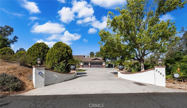 2465 Via Oeste Dr, Fallbrook, CA 92028 - view of property hidden behind natural elements featuring a gate