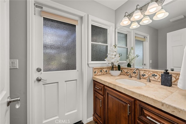 2465 Via Oeste Dr, Fallbrook, CA 92028 - bathroom featuring vanity and a chandelier