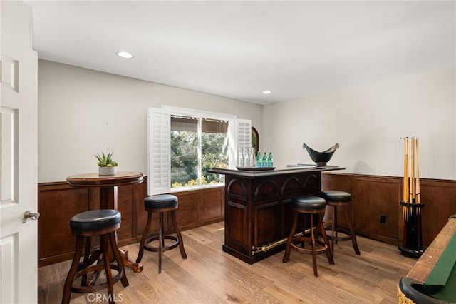 2465 Via Oeste Dr, Fallbrook, CA 92028 - indoor dry bar with light wood finished floors, a wainscoted wall, and recessed lighting