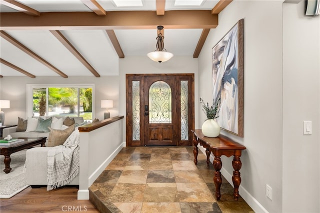 2465 Via Oeste Dr, Fallbrook, CA 92028 - entryway featuring beamed ceiling, baseboards, and stone finish flooring