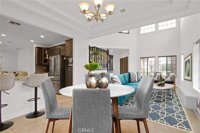 dining area featuring an inviting chandelier, recessed lighting, plenty of natural light, and visible vents