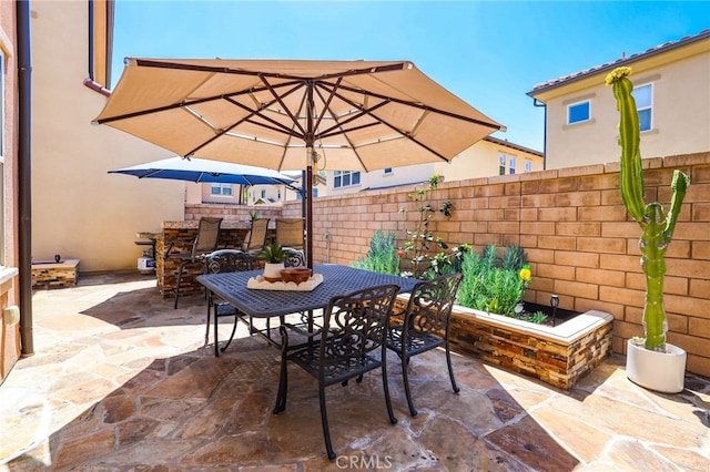 view of patio / terrace with fence and outdoor dining space