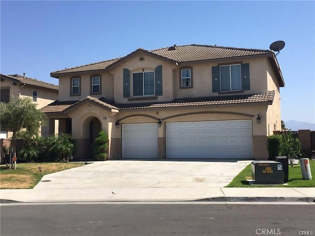 12369 Kern River Dr, Eastvale, CA 91752 - mediterranean / spanish home featuring a garage, stucco siding, concrete driveway, and a tiled roof