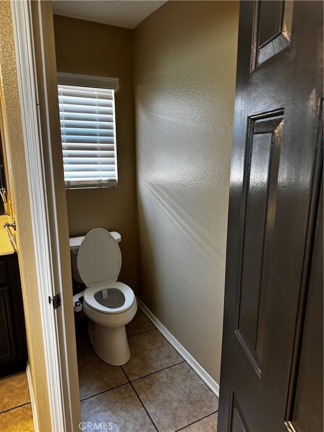 12369 Kern River Dr, Eastvale, CA 91752 - bathroom featuring tile patterned floors and vanity
