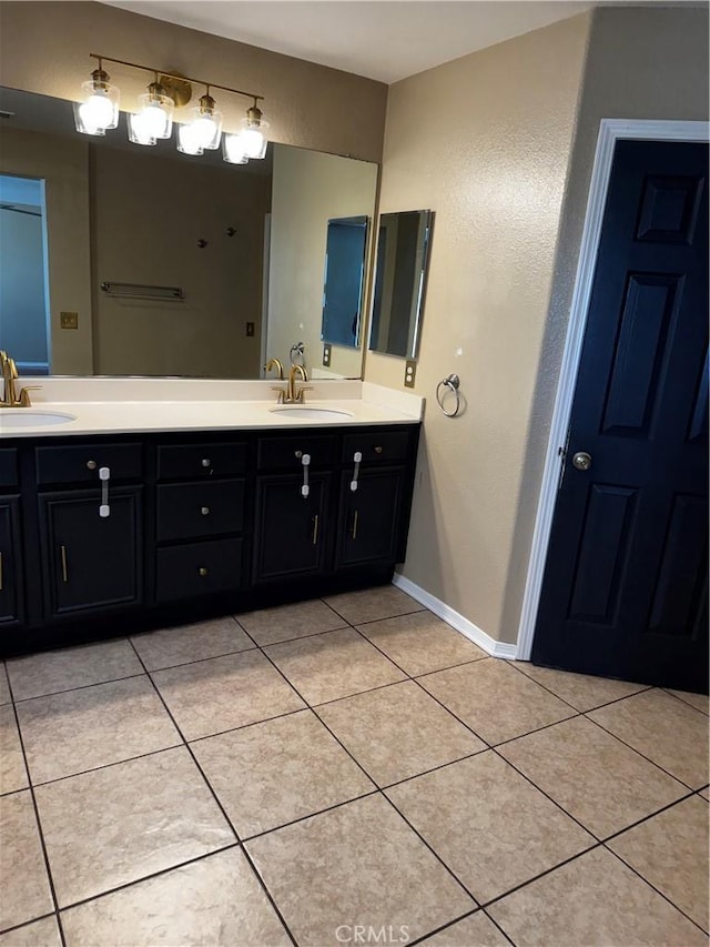 12369 Kern River Dr, Eastvale, CA 91752 - bathroom featuring double vanity and tile patterned flooring