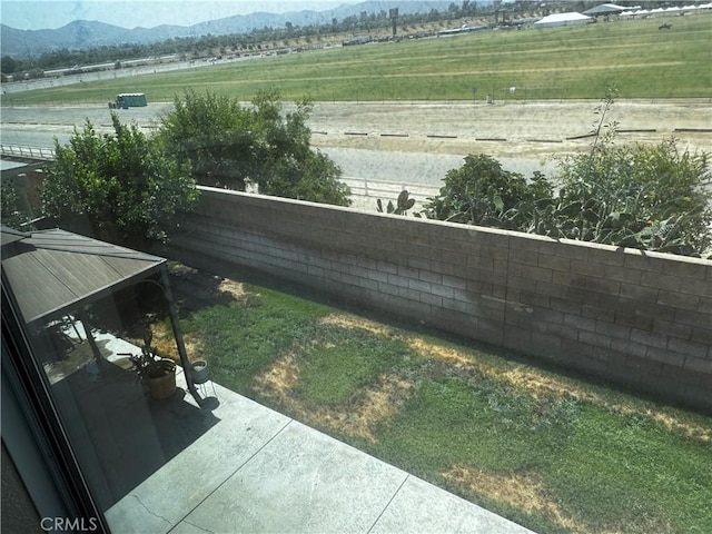12369 Kern River Dr, Eastvale, CA 91752 - view of yard with a mountain view, a rural view, and a patio