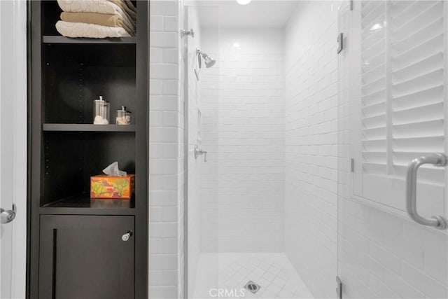bathroom featuring a shower stall