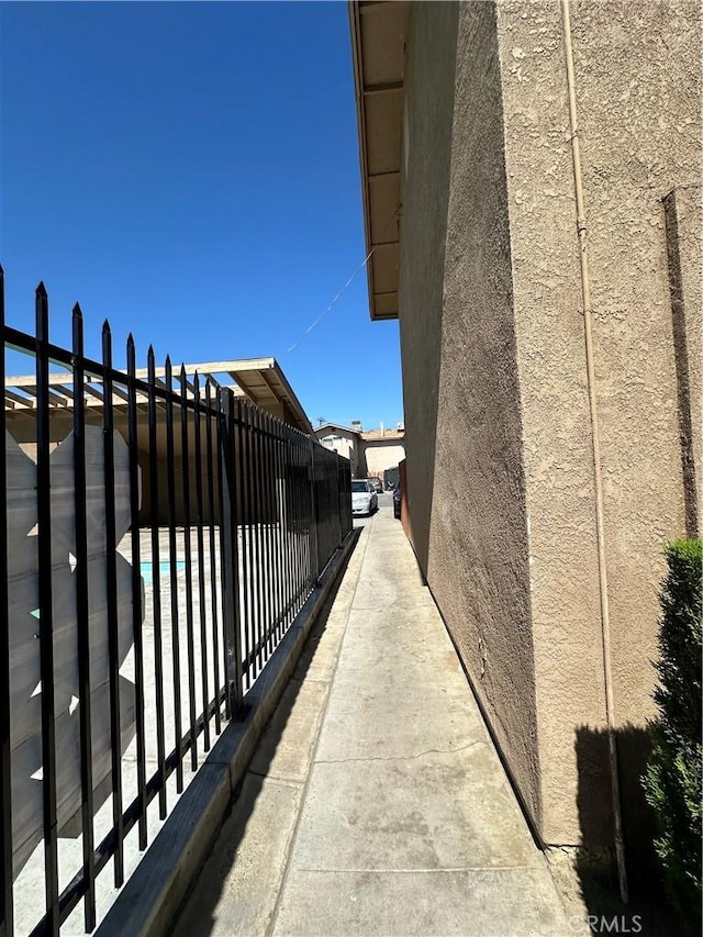 view of side of property with fence