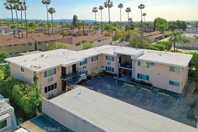 aerial view featuring a mountain view and a residential view