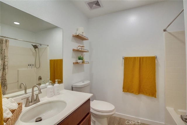 84105 Tramonto Way, Indio, CA 92203 - bathroom featuring vanity, toilet, visible vents, and shower / bath combo