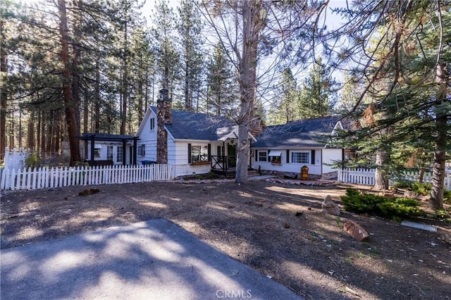 758 Elm St, Big Bear Lake, CA 92315 - view of front of home with a fenced front yard and a chimney