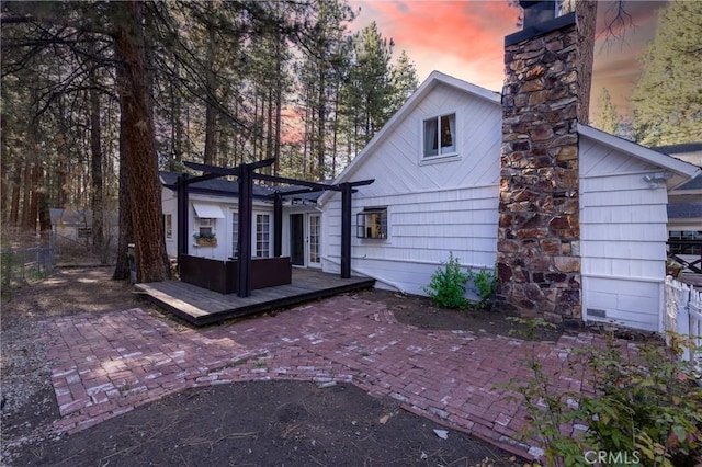 758 Elm St, Big Bear Lake, CA 92315 - back of house with a deck, a chimney, a patio area, and a pergola