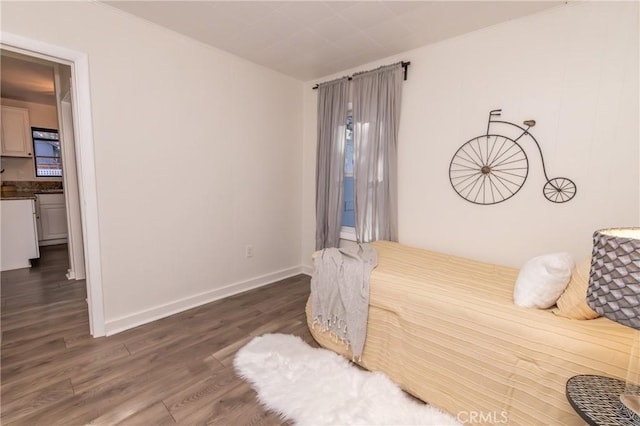 758 Elm St, Big Bear Lake, CA 92315 - bedroom with baseboards and wood finished floors
