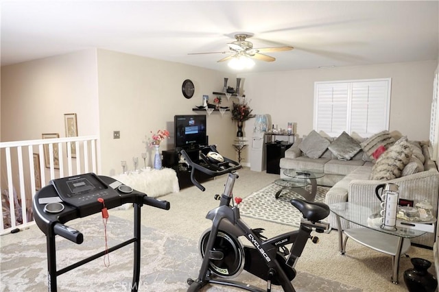 exercise room featuring carpet floors and ceiling fan