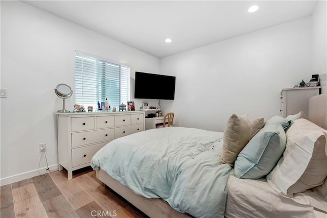 21733 Tuba St, Chatsworth, CA 91311 - bedroom featuring light wood-type flooring, recessed lighting, and baseboards