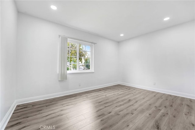 21733 Tuba St, Chatsworth, CA 91311 - empty room featuring recessed lighting, baseboards, and wood finished floors