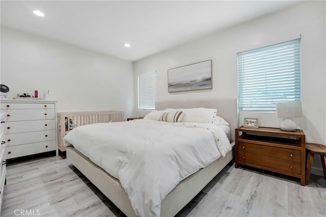 21733 Tuba St, Chatsworth, CA 91311 - bedroom with recessed lighting and light wood-style flooring