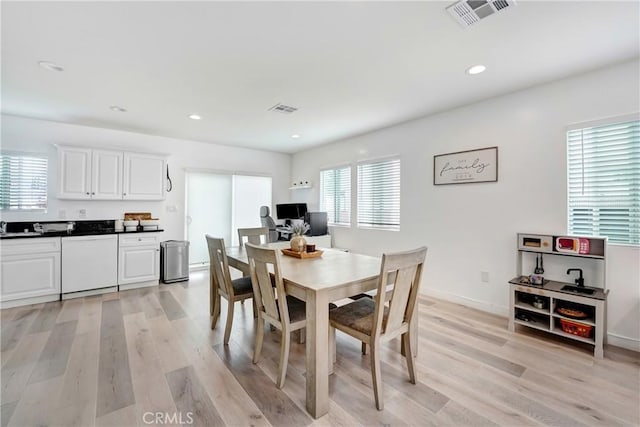 21733 Tuba St, Chatsworth, CA 91311 - dining room with recessed lighting, visible vents, and light wood-type flooring