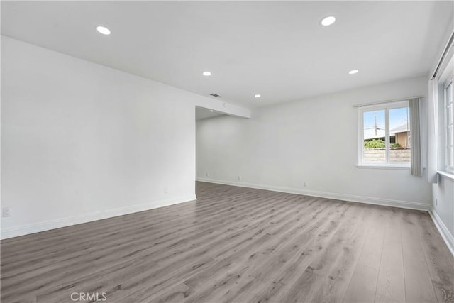 21733 Tuba St, Chatsworth, CA 91311 - unfurnished room with recessed lighting, baseboards, and wood finished floors