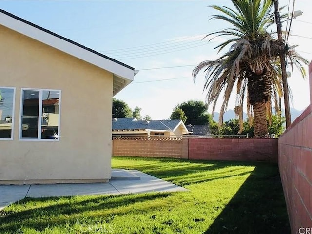 21733 Tuba St, Chatsworth, CA 91311 - view of yard featuring a fenced backyard and a patio area