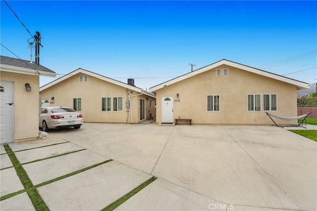 21733 Tuba St, Chatsworth, CA 91311 - rear view of house with a patio area and stucco siding